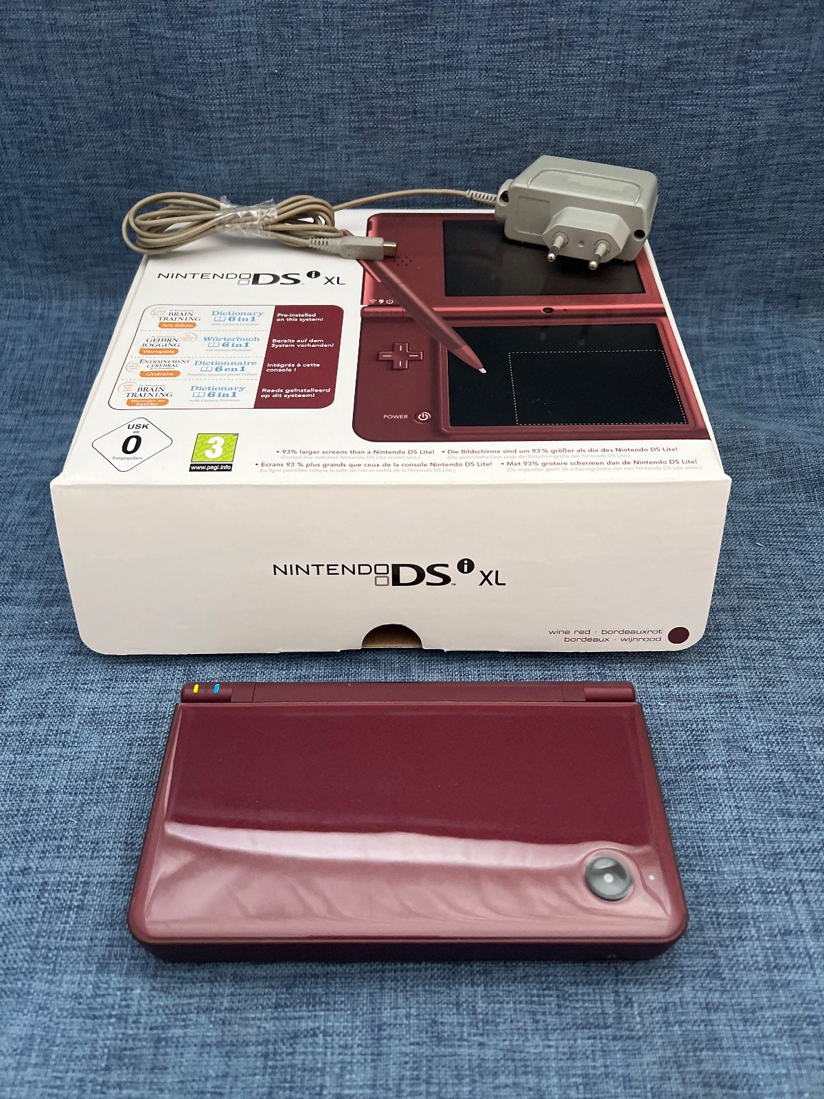 Nintendo DSi XL , OVP, Ladekabel,  2x Spiele, ohne Stift, Bordeauxrot
