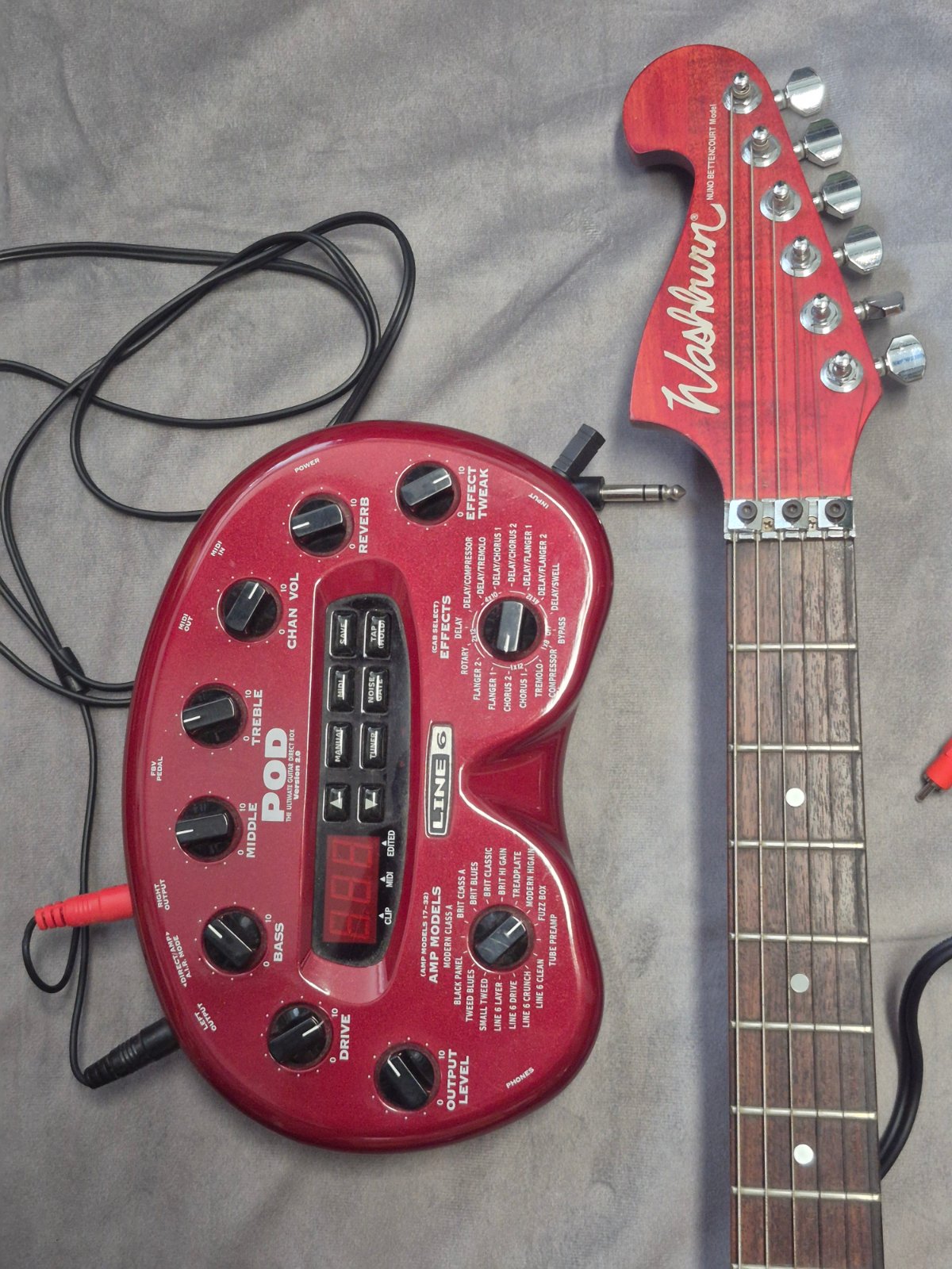 Washburn Nuno Bettencourt E-Gitarre + Line 6 POD 2.0 Set Kabel Gurt rot