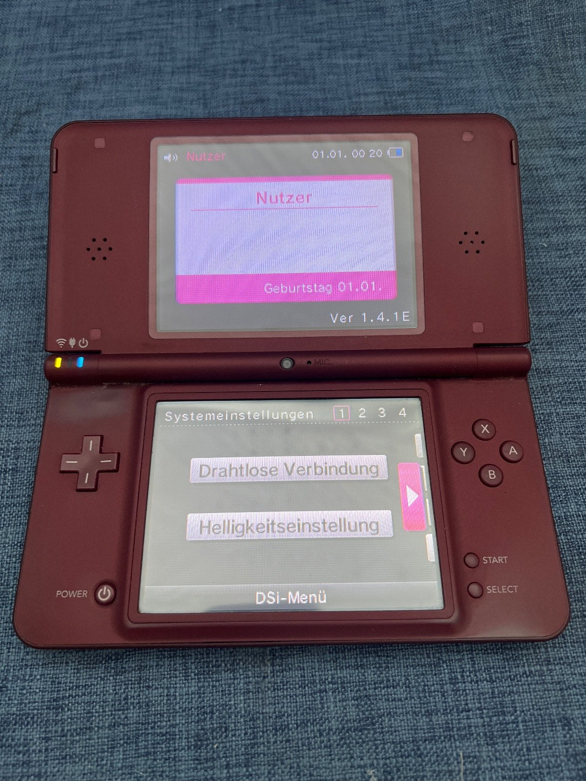 Nintendo DSi XL , OVP, Ladekabel,  2x Spiele, ohne Stift, Bordeauxrot