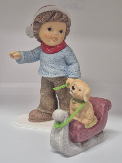Goebel - Limpke Figur Kind mit Hund Schlitten Weihnachten   Sammlerfigur