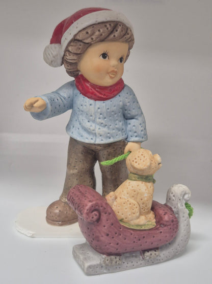 Goebel - Limpke Figur Kind mit Hund Schlitten Weihnachten   Sammlerfigur